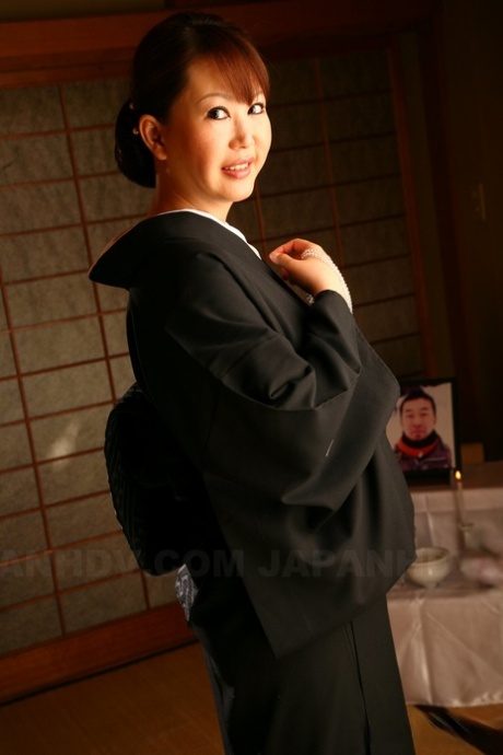 Japanese redhead Waka Kano kisses her man after he plays with her breasts