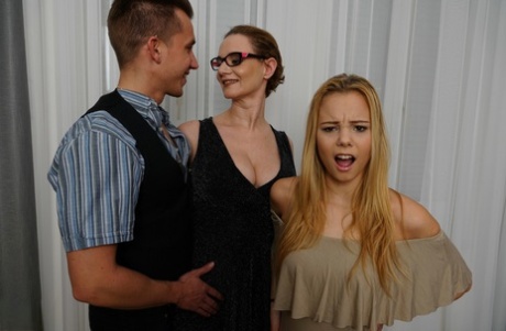 Horny lady and her stepdaughter indulge in a hardcore threesome