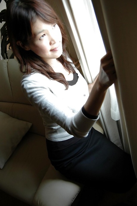 Foxy asian MILF Takako Yanase undressing and spreading her legs