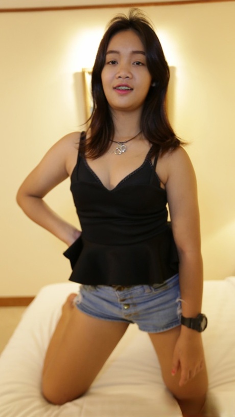 Beautiful Asian babe Apple P shows her hairy cunt while enjoying POV sex