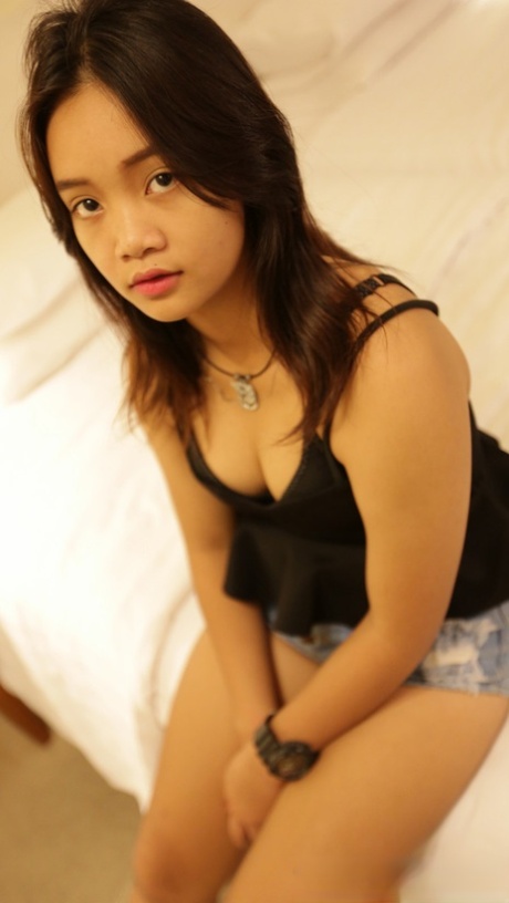Beautiful Asian babe Apple P shows her hairy cunt while enjoying POV sex