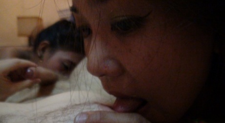 Petite Filipina babes April Dizon & May Capangpangan undress & share a dick