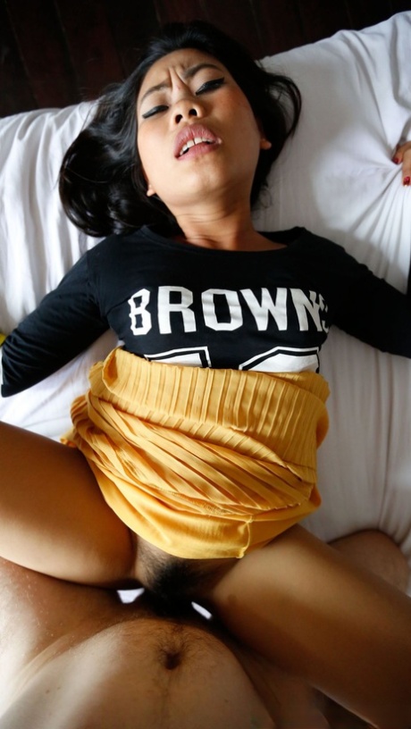 Dark haired Asian female Way lifts up her dress and gets her hairy twat fucked